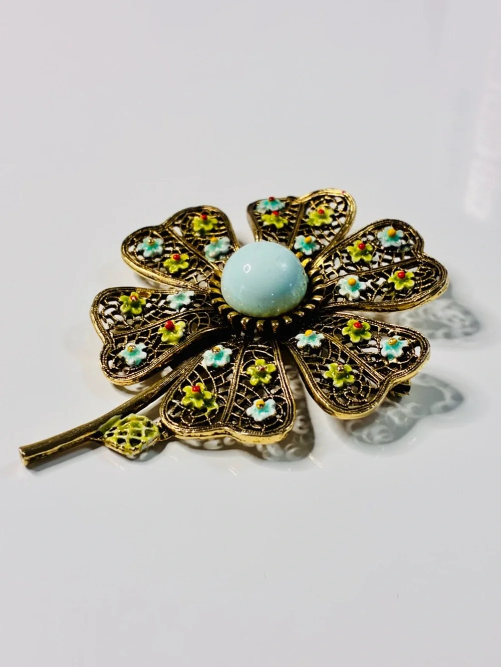 VTG Art Floral Filigree Flower Brooch with Pale Blue Cabochon Signed Oversized
